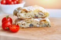 Fresh piece of savory strudel stuffed with chicken meat and mushrooms s