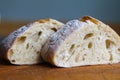 Fresh pieces of ciabatta on a wooden table. Italian Cuisine Royalty Free Stock Photo