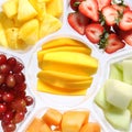 Fresh pieces of fruits in plastic container