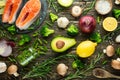 Fresh pieces of salmon steak, trout, salmon, pink salmon. With ingredients vegetables, avocado, rosemary and broccoli. Healthy and Royalty Free Stock Photo