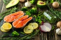 Fresh pieces of salmon steak, trout, salmon, pink salmon. With ingredients vegetables, avocado, rosemary and broccoli. Healthy and Royalty Free Stock Photo