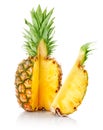 Fresh pineapple with cut and green leaves Royalty Free Stock Photo