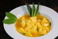 Fresh pineapple dessert recipe with mint orange coulis Royalty Free Stock Photo