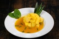 Fresh pineapple dessert recipe with mint orange coulis Royalty Free Stock Photo