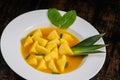 Fresh pineapple dessert recipe with mint orange coulis Royalty Free Stock Photo