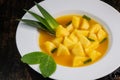 Fresh pineapple dessert recipe with mint orange coulis Royalty Free Stock Photo