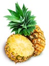 Fresh pineapple and a half isolated on white Royalty Free Stock Photo