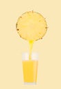 Fresh pineapple juice on pastel background Royalty Free Stock Photo