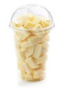 Fresh pineapple pieces salad in plastic cup