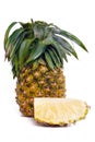 Fresh pineapple with slices isolated on white