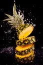 Fresh pineapple in splash water Royalty Free Stock Photo