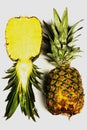 Fresh pineapple on white background, cut on half and whole pineapple, ananas Royalty Free Stock Photo