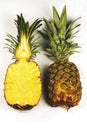 Fresh pineapple on white background, cut on half and whole pineapple, ananas Royalty Free Stock Photo