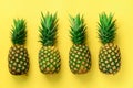 Fresh pineapples on yellow background. Top View. Pop art design, creative concept. Copy Space. Bright pineapple pattern Royalty Free Stock Photo