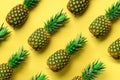 Fresh pineapples on yellow background. Top View. Pop art design, creative concept. Copy Space. Bright pineapple pattern Royalty Free Stock Photo