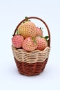 fresh pineberries in a basket on a white background Royalty Free Stock Photo