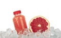 Fresh pink grapefruit juice and cut slice on ice Royalty Free Stock Photo