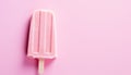 Fresh pink ice cream on a stick on a pink background