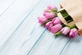 Fresh pink tulip flowers in paper bag Royalty Free Stock Photo