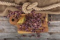 Fresh pistachios in copper bowl on wooden rustic background, wonderful peanut composition for healthy and dietary nutrition.