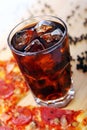 Fresh pizza and cold cola drink Royalty Free Stock Photo