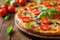 Fresh pizza with mushroom , cheese and tomatoes served on wooden plate on wooden table Royalty Free Stock Photo