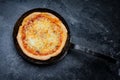 Fresh Pizza in an rustic iron Pan Royalty Free Stock Photo