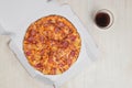 Fresh pizza with salami and mushrooms and cold cola drink, Royalty Free Stock Photo