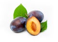 Fresh plum fruits with green leaf Royalty Free Stock Photo