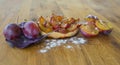 Tartlet of fresh plum, fresh plum fruit on a wooden Board.