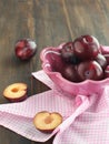 Fresh plums in a bowl. Royalty Free Stock Photo