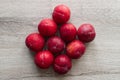 Fresh plums isolated on wooden table background Royalty Free Stock Photo