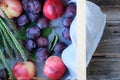 Fresh plums and peaches in a wooden box Royalty Free Stock Photo