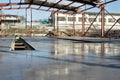 Fresh polished concrete slab and metal construction