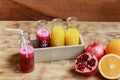 Fresh pomegranate juice and orange squeeze Royalty Free Stock Photo