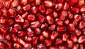 Fresh pomegranate seeds, close up, background Royalty Free Stock Photo