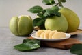 Fresh pomelo fruit on gray cement background