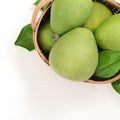 Fresh pomelo, pummelo, grapefruit, shaddock on white cement background in bamboo basket. Autumn seasonal fruit, top view, flat lay Royalty Free Stock Photo