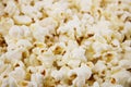 Fresh popcorn background. Popcorn texture. Corn snacks close up Royalty Free Stock Photo