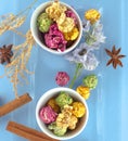 Fresh popcorn in yellow bowl on white wooden table. Selective focus. Royalty Free Stock Photo