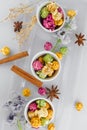 Fresh popcorn in yellow bowl on white wooden table. Selective focus. Royalty Free Stock Photo