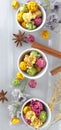 Fresh popcorn in yellow bowl on white wooden table. Selective focus. Royalty Free Stock Photo