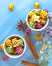 Fresh popcorn in yellow bowl on white wooden table. Selective focus. Royalty Free Stock Photo