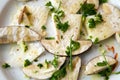 Fresh porcini mushrooms in salad with oil and parsley Royalty Free Stock Photo