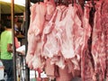 Fresh pork fillet hanging on display for sale Royalty Free Stock Photo