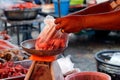 Fresh pork market, meat in vegetable market and Merchants are sliced meat with a knife,