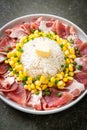 Fresh pork raw sliced with rice and corn on plate and ready to cook Royalty Free Stock Photo