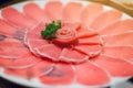 Fresh pork slice for shabu or sukiyaki on circle dish