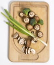 Fresh portabello mushrooms on the cutting board