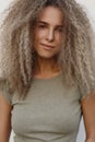 Fresh portrait of a beautiful young curly girl with a hairstyle Royalty Free Stock Photo